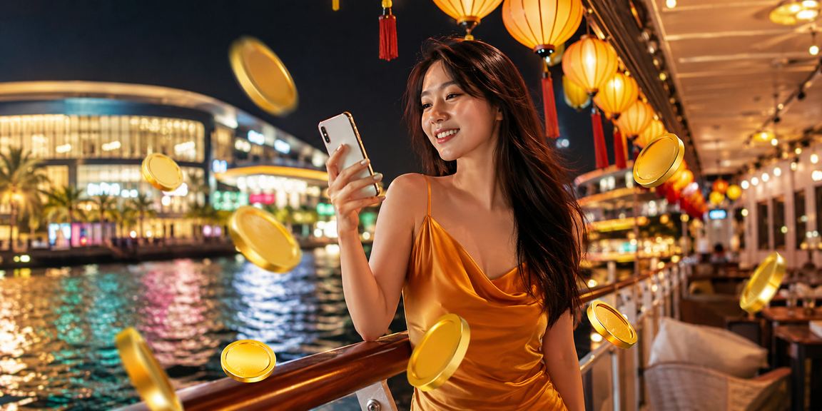 Khung cảnh chợ đêm Phú Quốc với người chơi nhận cashback bonus trực tuyến